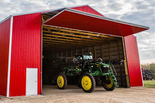 Bifold commercial door, perfect for this farm building that did not have enough overhead space for a sectional door